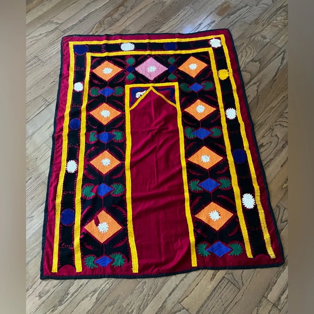 Suzane embroidered with cotton threads on cotton red fabric, hand made